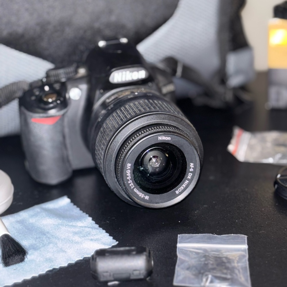 Nikon Black Digital Camera Bundle with lens, cleaning kit bag and more